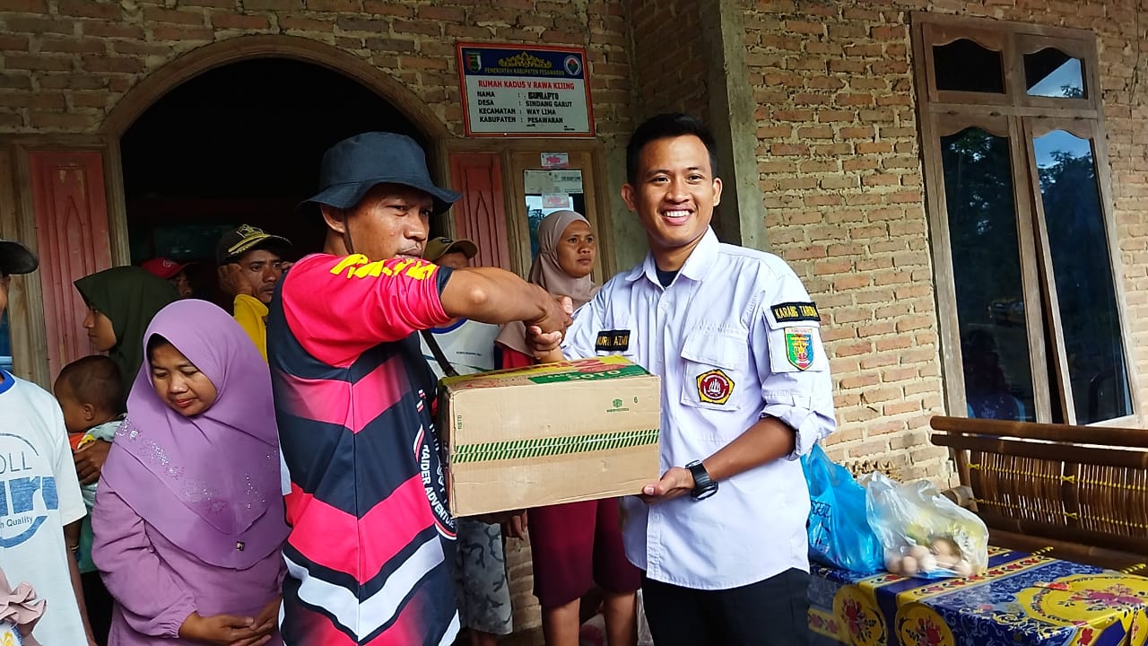 Bakti Sosial Karang Taruna Pesawaran Saat Banjir Melanda